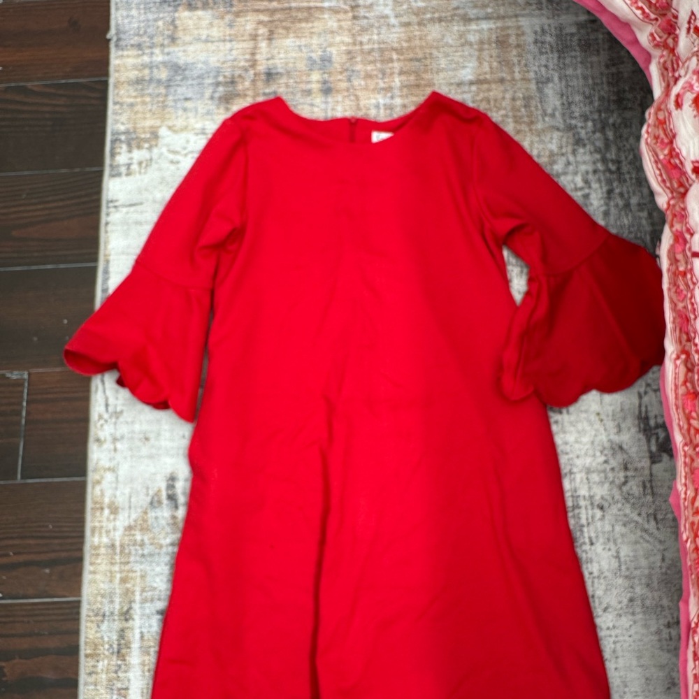 this is a red dress that zips in the back with half sleeves